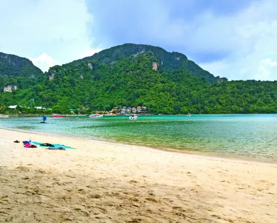 FAQ page photo A beautiful beach, water, and mountain